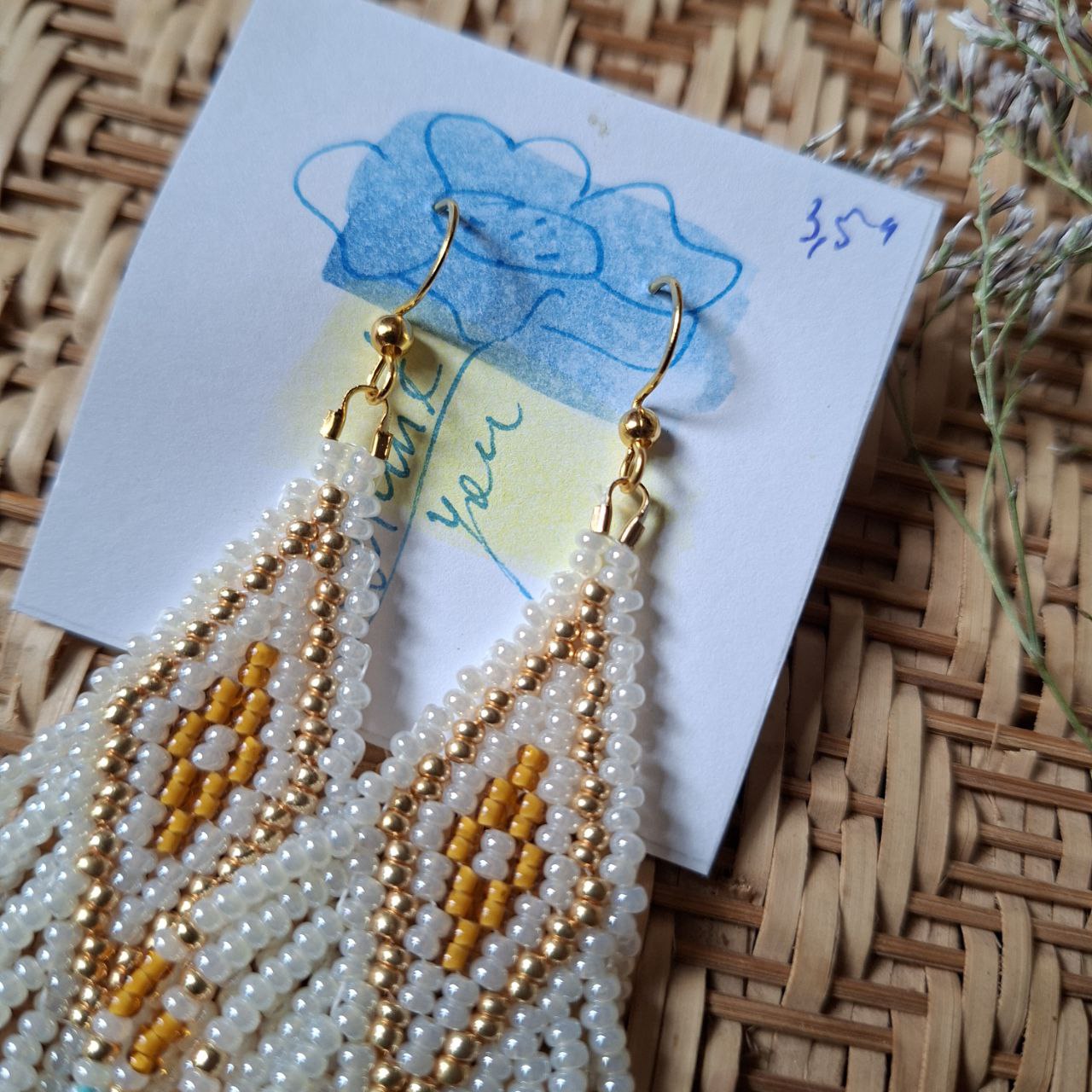 Elegant handmade bead earrings in turquoise tones