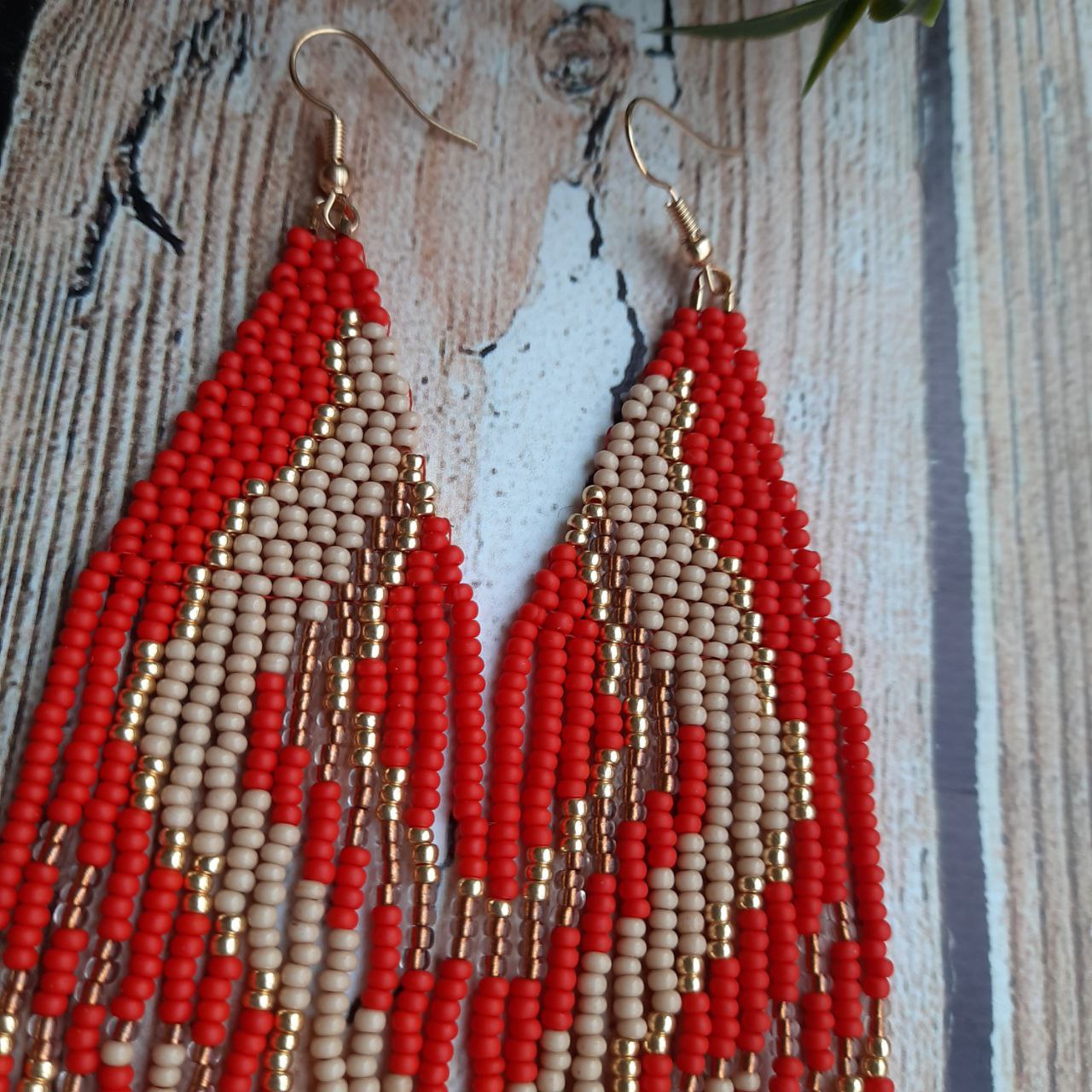 Elegant red beaded earrings designed for statement style.