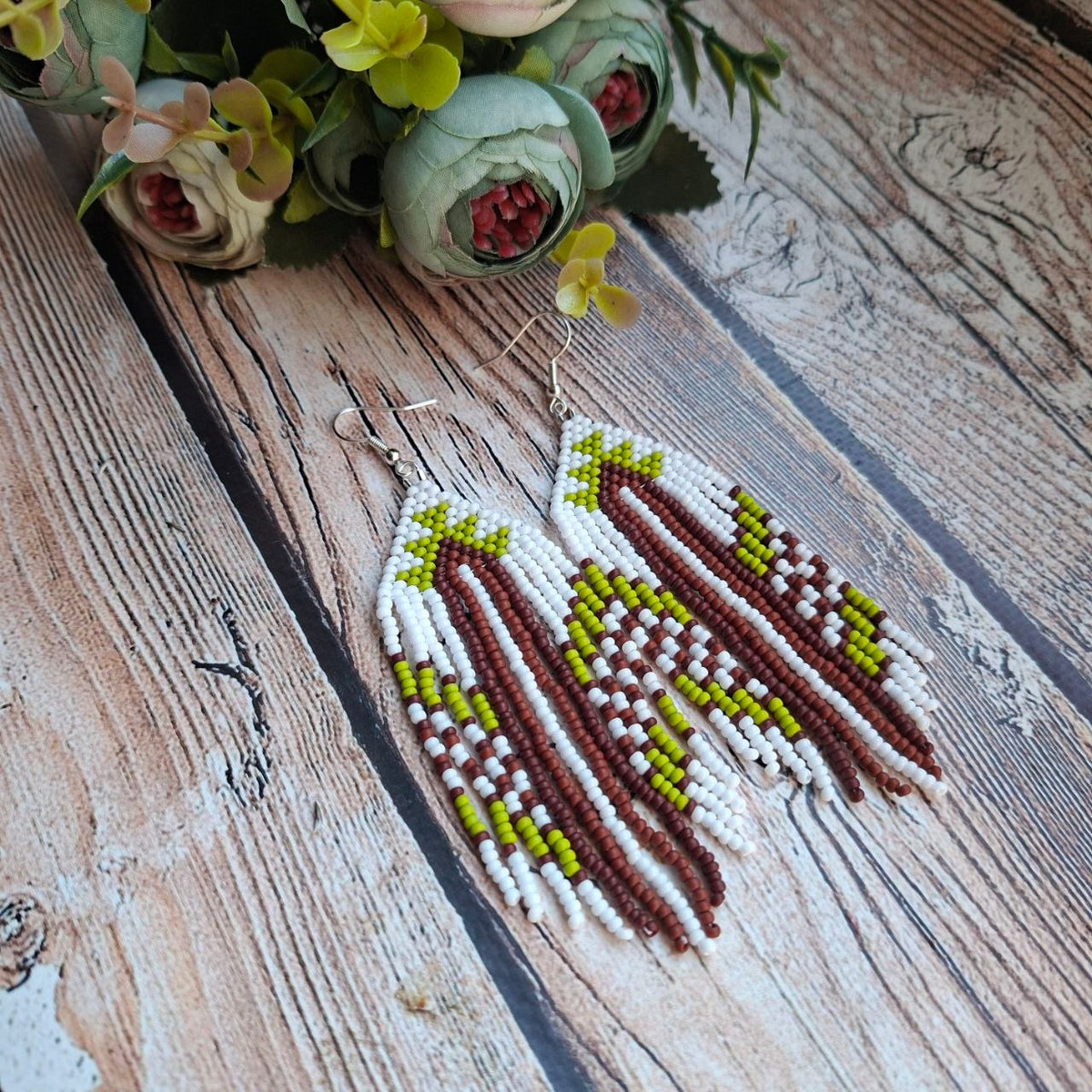 Handmade beaded earrings with unique design. Lightweight and perfect for everyday style