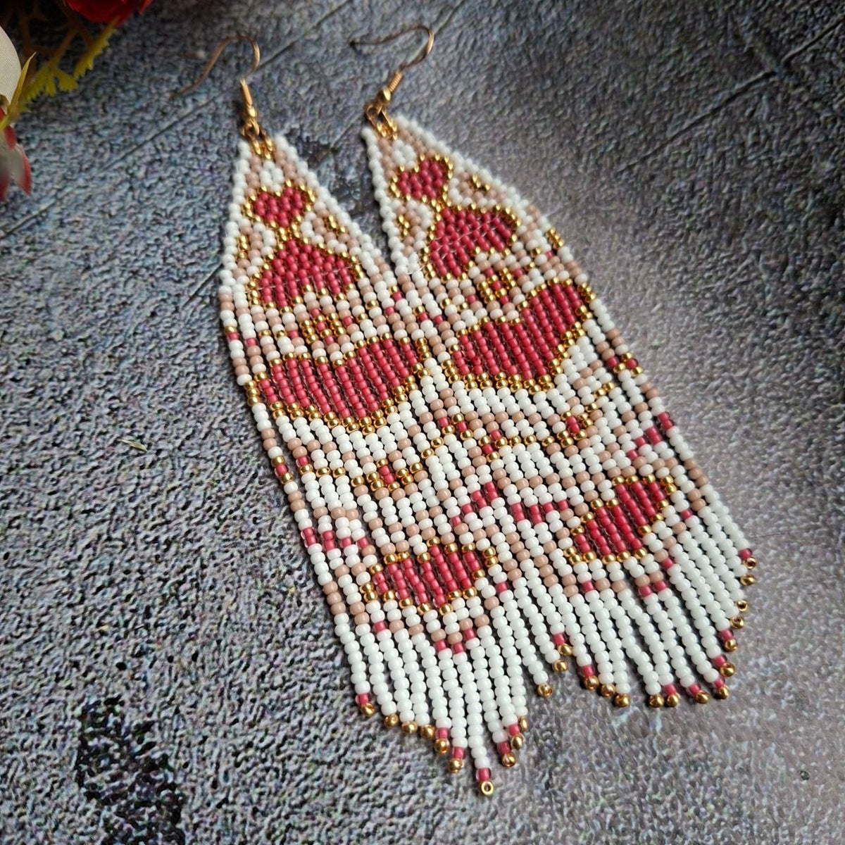 Beautiful combination of ivory, pink, and gold beads.