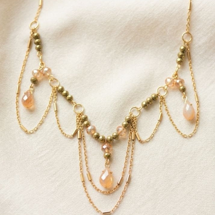 Layered chain necklace detail